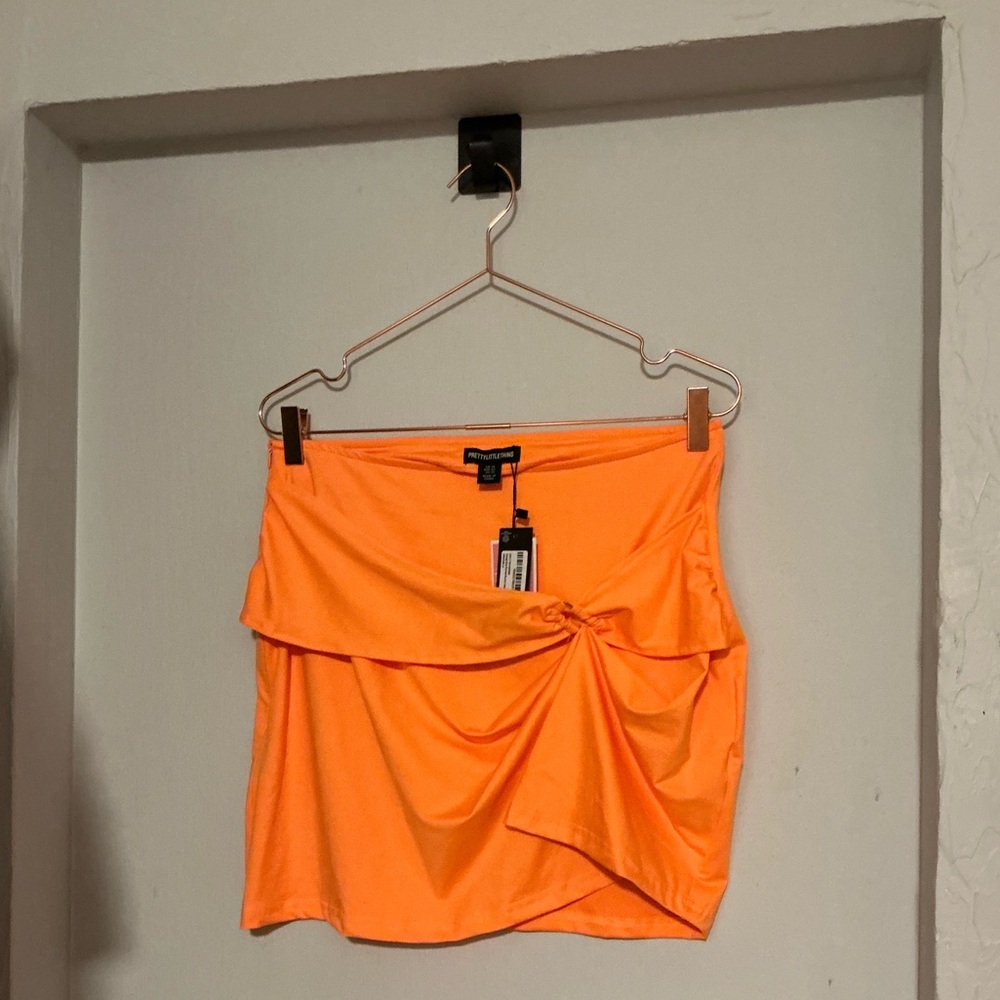 Orange mini skirt